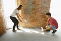 Young couple doing apartment repair together themselves Royalty Free Stock Photo