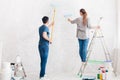 Young couple doing apartment repair together themselves Royalty Free Stock Photo