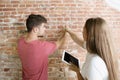 Young couple doing apartment repair together themselves Royalty Free Stock Photo
