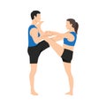 Young couple doing Extended Hand to Big Toe yoga pose, Utthita Hasta Padangushthasana Royalty Free Stock Photo