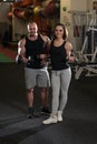 Young Couple Doing Heavy Weight Exercise For Biceps Royalty Free Stock Photo