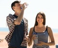 Young couple drink water
