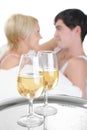 Young couple drinking champagne in bed Royalty Free Stock Photo