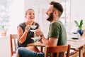 Young couple drinking coffee and having fun Royalty Free Stock Photo