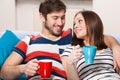 Young couple drinking coffee at home Royalty Free Stock Photo