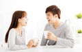 young Couple drinking coffee In living room Royalty Free Stock Photo