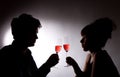 Young couple drinking rose wine Royalty Free Stock Photo