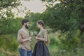 young couple drinking standing drinking wine from glasses Royalty Free Stock Photo