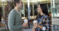 Young couple drinking takeaway beverages Royalty Free Stock Photo