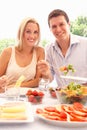 Young couple eating outdoors Royalty Free Stock Photo