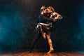 Young couple in elegant evening dresses dancing Royalty Free Stock Photo