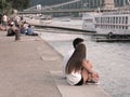 Young couple, embankment of Danube, Budapest, usual life