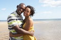 Young Couple Embracing On Beach Royalty Free Stock Photo