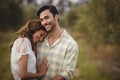 Young couple embracing at olive farm Royalty Free Stock Photo