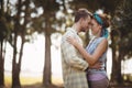 Young couple embracing at olive farm on sunny day Royalty Free Stock Photo