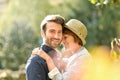 Young couple embracing in park Royalty Free Stock Photo