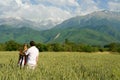 Young couple enjoing beauty of nature