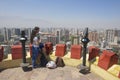 Young couple enjoy the view of Santiago city from the Santa Lucia hill fortress in Santiago, Chile.