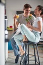 A young couple enjoying beautiful morning at home on Valentine`s day. Couple, love, breakfast, together Royalty Free Stock Photo