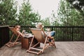 Young couple enjoying coffee on the balcony Royalty Free Stock Photo