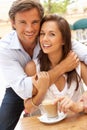 Young Couple Enjoying Coffee And Cake Royalty Free Stock Photo