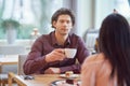 Young Couple Enjoying Coffee And Cake In Cafe Royalty Free Stock Photo