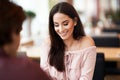 Young Couple Enjoying Coffee And Cake In Cafe Royalty Free Stock Photo