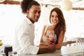 Young Couple Enjoying Drink At Outdoor Bar Royalty Free Stock Photo