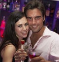 Young Couple Enjoying Drinks In Bar Royalty Free Stock Photo