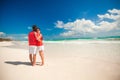 Young couple enjoying each other on a tropical Royalty Free Stock Photo