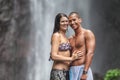 Couple at waterfall Royalty Free Stock Photo