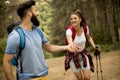 Young couple enjoying hiking in nature