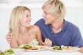 Young Couple Enjoying Meal Royalty Free Stock Photo