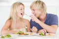 Young Couple Enjoying Meal Royalty Free Stock Photo