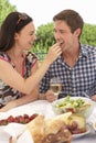 Young Couple Enjoying Outdoor Meal Together Royalty Free Stock Photo