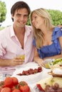 Young Couple Enjoying Outdoor Meal Together Royalty Free Stock Photo