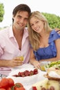 Young Couple Enjoying Outdoor Meal Together Royalty Free Stock Photo