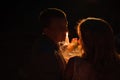 Young couple enjoying a romantic dinner by candlelight, outdoors Royalty Free Stock Photo