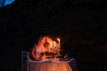 Young couple enjoying a romantic dinner by candlelight, outdoors Royalty Free Stock Photo