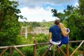 Young couple enjoying a view on Chamarel falls of Mauritius Royalty Free Stock Photo