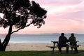 Young couple enjoys the sunset Royalty Free Stock Photo