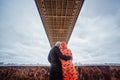 Young couple in the evening under the bridge Royalty Free Stock Photo