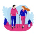 Young couple exercise Nordic walking in park