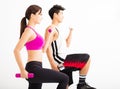 Young couple exercising with dumbbell Royalty Free Stock Photo