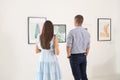 Young couple at exhibition Royalty Free Stock Photo