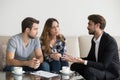 Young couple, family at meeting with realtor, interior designer Royalty Free Stock Photo