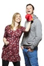 Young couple fighting with boxing gloves smiling Royalty Free Stock Photo