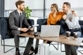 Young couple with financial advisor at the office Royalty Free Stock Photo