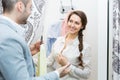 Young couple at fitting room Royalty Free Stock Photo