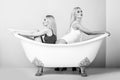 Young couple foreplay lying in tub, intimacy lovers, women Royalty Free Stock Photo